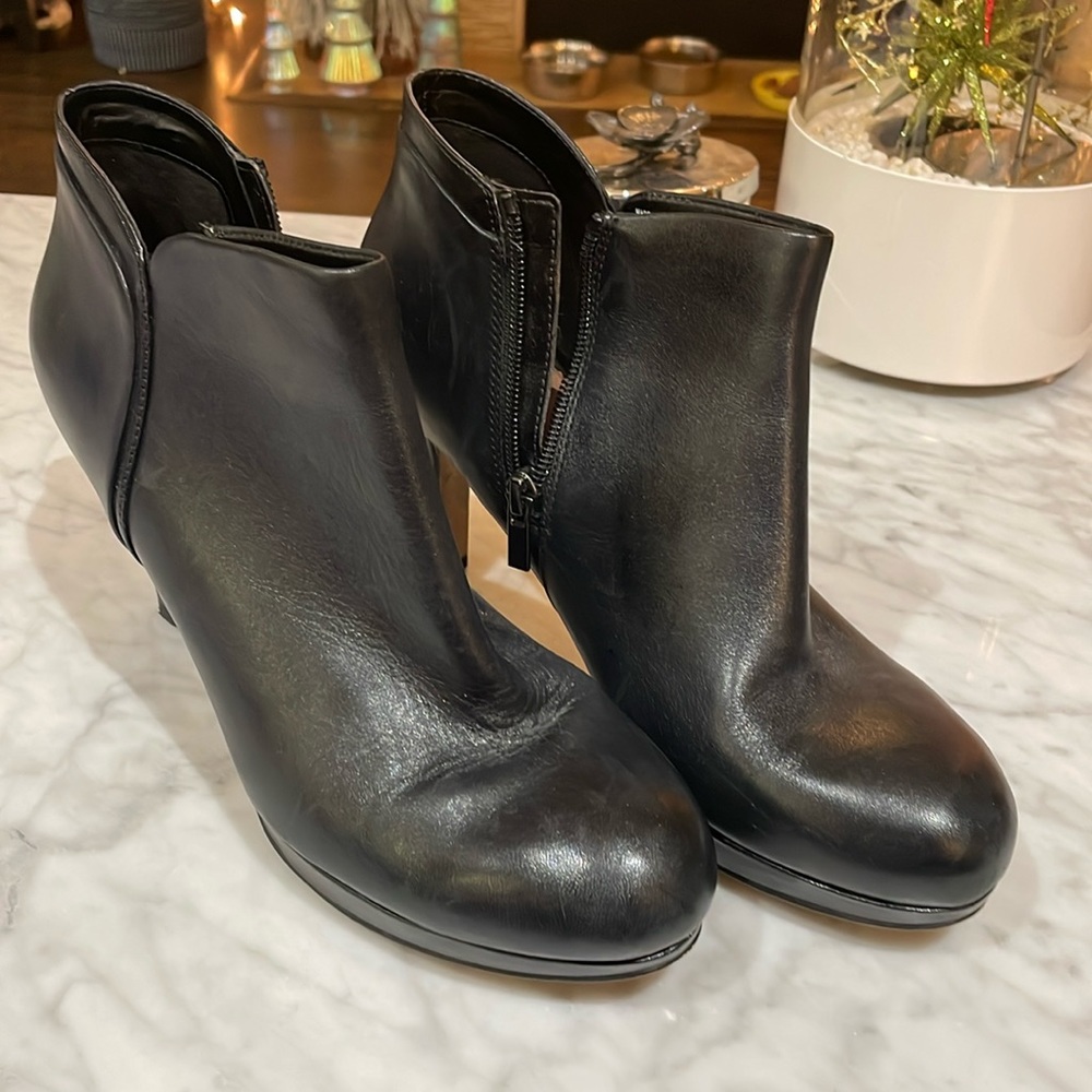 Clarks Booties with heel, black with side zip, worn once or twice. Size 9 1/2